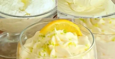 Zitronen-Creme-Käse-Dessert auf einem Teller mit frischen Zitronen