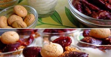 Amaretto Mousse mit Zimt-Pflaumen serviert auf einem eleganten Dessertteller