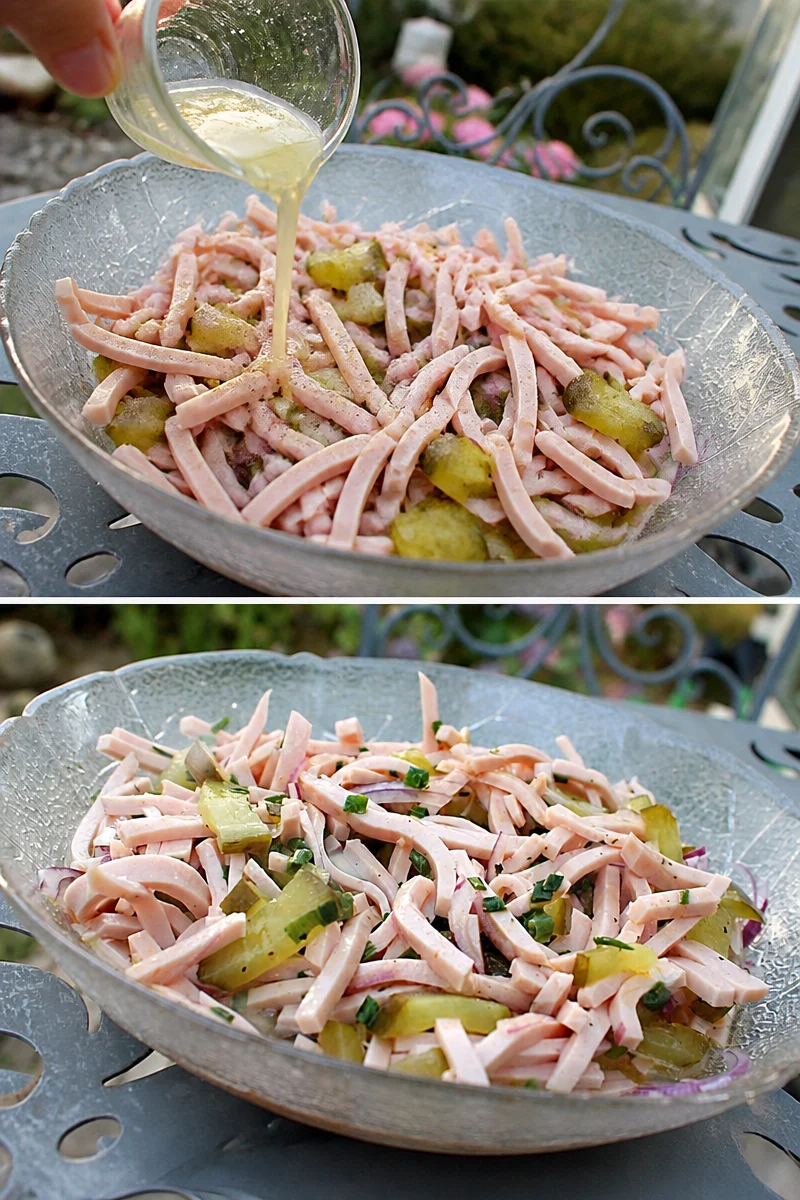 Bayerischer Wurstsalat mit Wurst, Zwiebeln und Essiggurken.