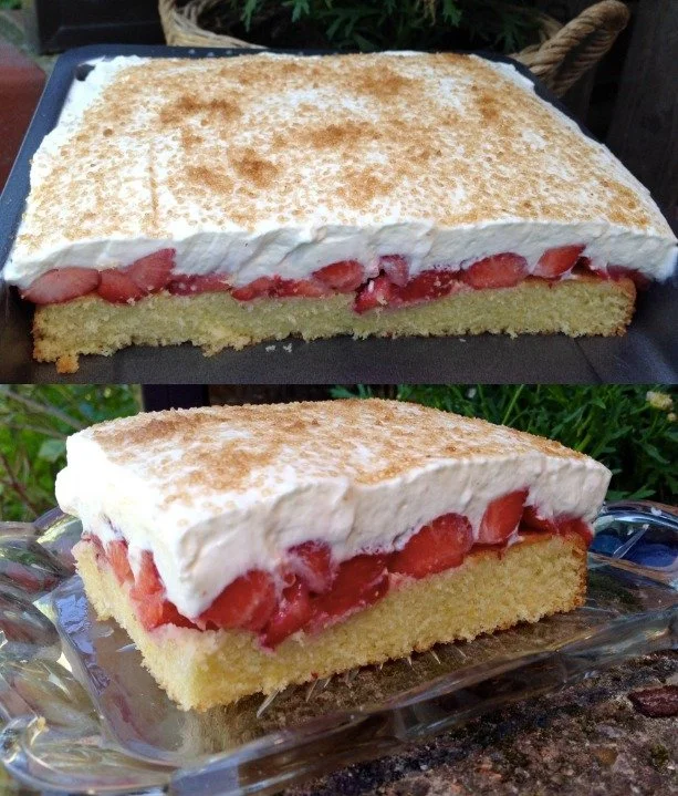 Erdbeer-Sahne Kuchen mit frischen Erdbeeren und Sahnehaube auf einem Teller.