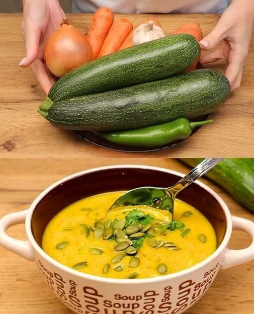 Schüssel mit Karotten-Zucchini-Suppe, gesund und lecker zubereitet.