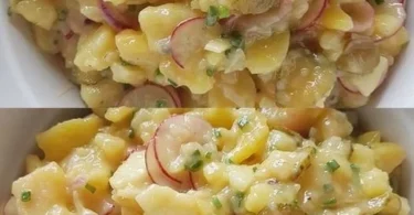 Ein delikater Kartoffelsalat mit frischem Gemüse und Dressing