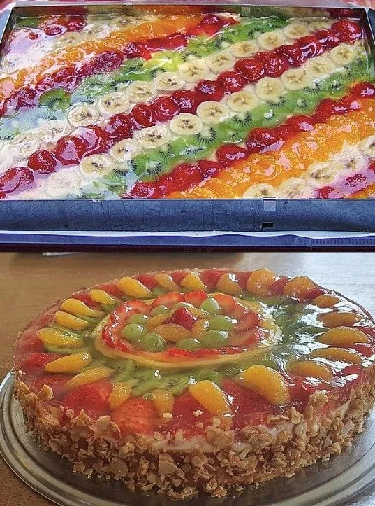 Ein köstlicher Obstkuchen mit Puddingcreme und frischen Früchten garniert.
