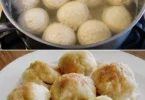 Leckere Pflaumendumplings frisch serviert auf einem Teller