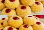 Leckere Plätzchen mit Konfitüre auf einem Teller