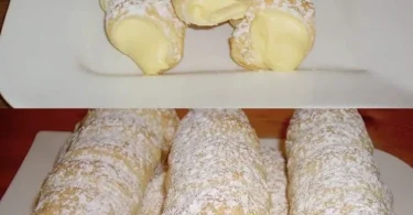 Schaumrollen mit italienischer Eischnee-Füllung auf einem Teller