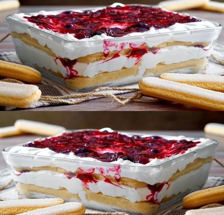 Leckeres Schichtdessert mit bunten Schichten und frischen Früchten.