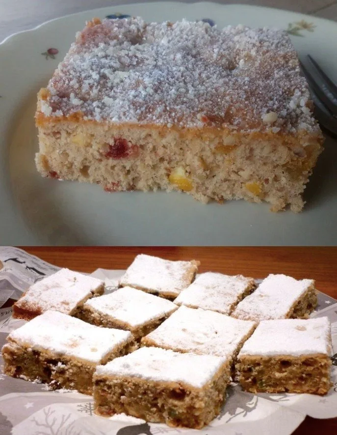 Stollenkuchen vom Blech mit Marzipan auf einem Teller serviert