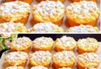 Streuselmuffins mit Quark auf einem Teller, frisch gebacken und dekoriert.