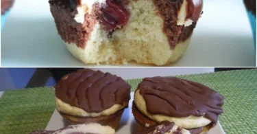 Leckere Donauwellen Muffins auf einem Teller, dekoriert mit Schokolade und Kirschen.