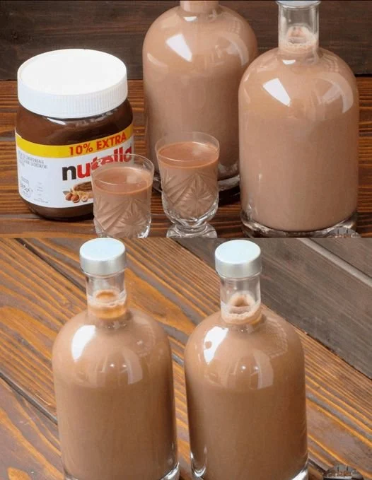 Ich verühre 0,8 Liter Rum mit 450 g Nutella für den Likör - Kochen Mit Uns