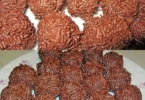 Leckere Rumkugeln gefüllt mit Schokolade und Rum auf einem Teller